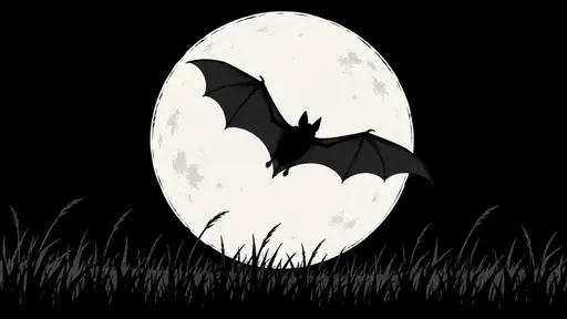A bat silhouette across a full moon with silhouetted grass at the bottom.