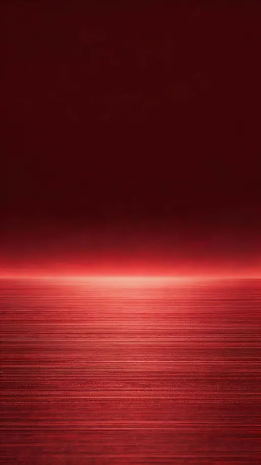Vertical 9:16 studio product photograph of subtle brushed red metal with fine grain, featuring a soft low-to-mid highlight band that fades into a clean, darker top for negative space.