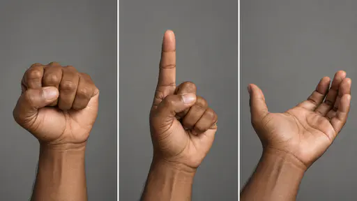 Three adult hands with medium-brown skin and short clean nails in three equal panels on mid-grey: a closed fist on the left, a hand with the index finger raised in the middle and an open hand cradled palm up on the right.