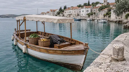 A small wooden water taxi with a canvas canopy rests alongside a stone landing stage with a rope looped round a bollard and wicker baskets of shopping and a folded pram on its bench seats, calm turquoise water and a whitewashed waterfront behind.